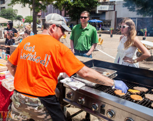 Jeff Loving, Executive Chef at Twisted Fork, serves burgers saturday at better block texarkana. 