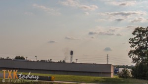 Smoke Next To Lowes Sign