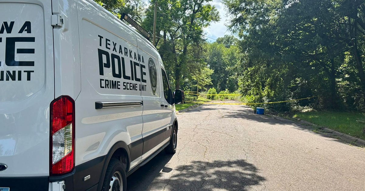 Photo of Crime scene van outside of crime scene.