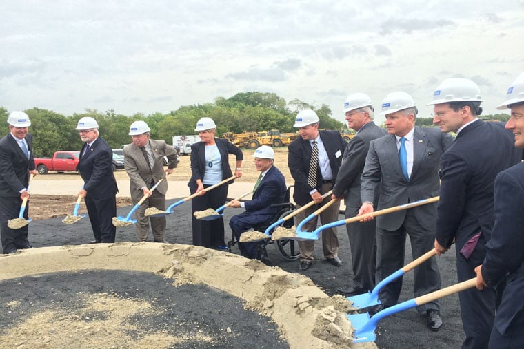 Gov. Greg Abbott, seated center, joins officials turning dirt with shovels at the 2015 groundbreaking for Facebook's Fort Worth data center