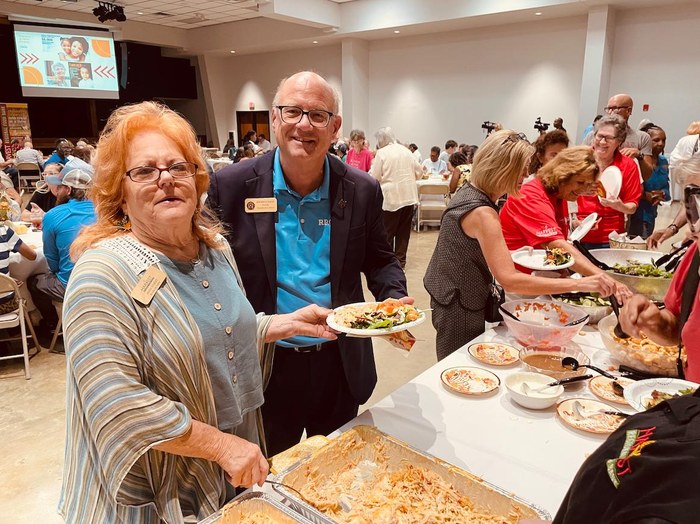 Volunteers serve lunch during Harvest Regional Food Bank's Hunger Action Luncheon