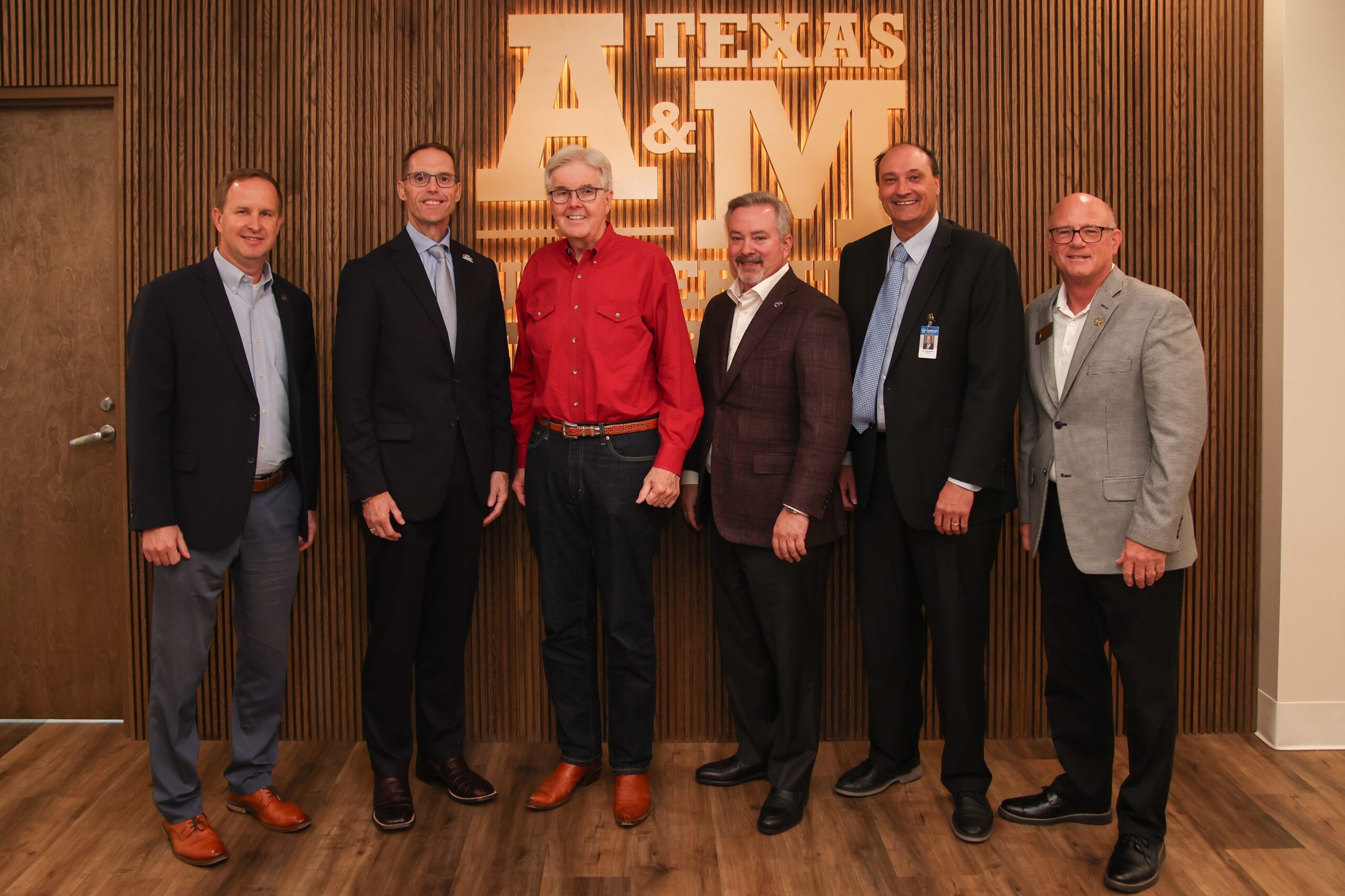 Lt. Governor Dan Patrick poses for a group photo with Texarkana community leaders at a round table discussion at Texas A&M University Texarkana.