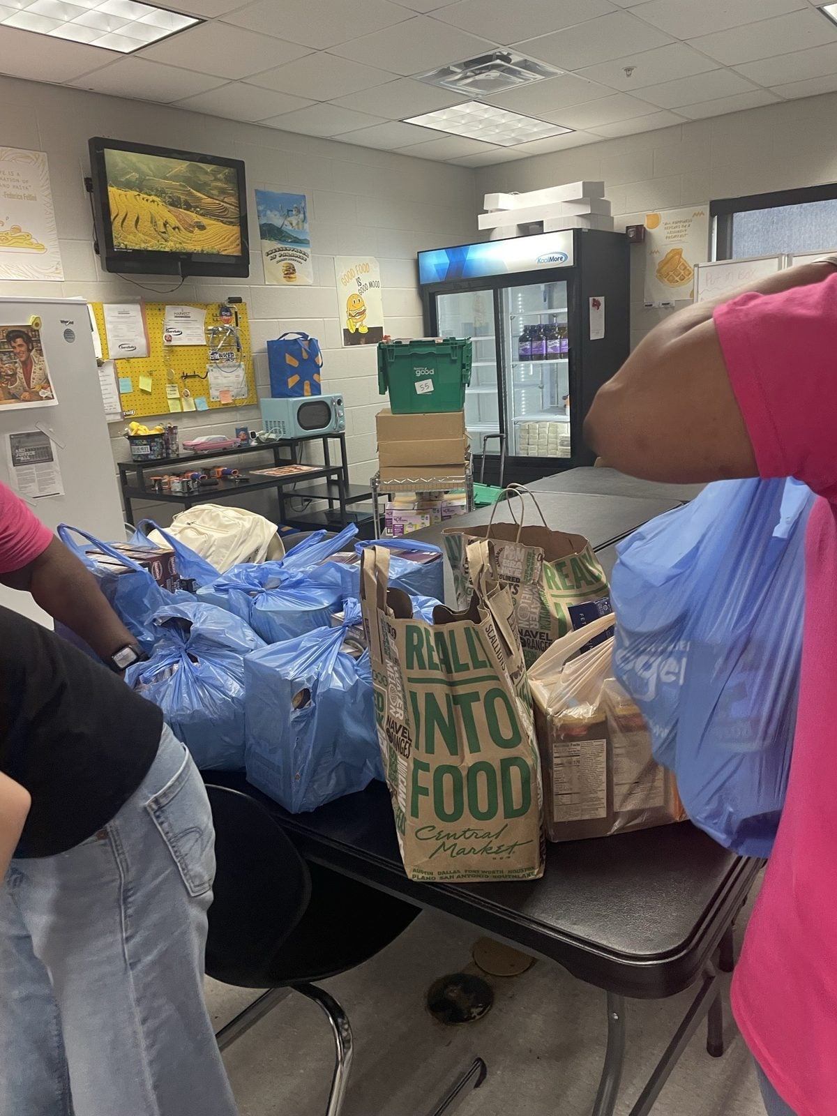 Bags of donated food on a table inside the Arkansas High Pig Pantry. Submitted photo. Bags of donated food on a table inside the Arkansas High Pig Pantry
