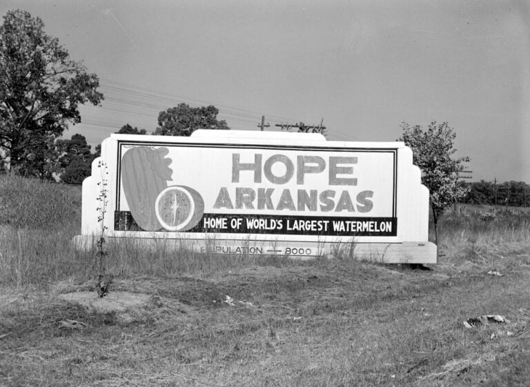 The Hope city-limits sign in 1942: "Home of World's Largest Watermelon." Vachon shot it while following the pipeline crews. Photo: John Vachon, Office of War Information, Library of Congress. 1942 Hope, Arkansas, city limits sign: Home of World's Largest Watermelon