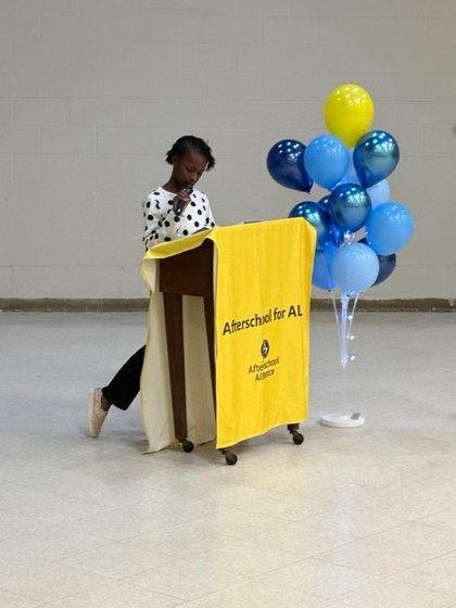 A Read and Rise student speaks at the Lights On Afterschool rally