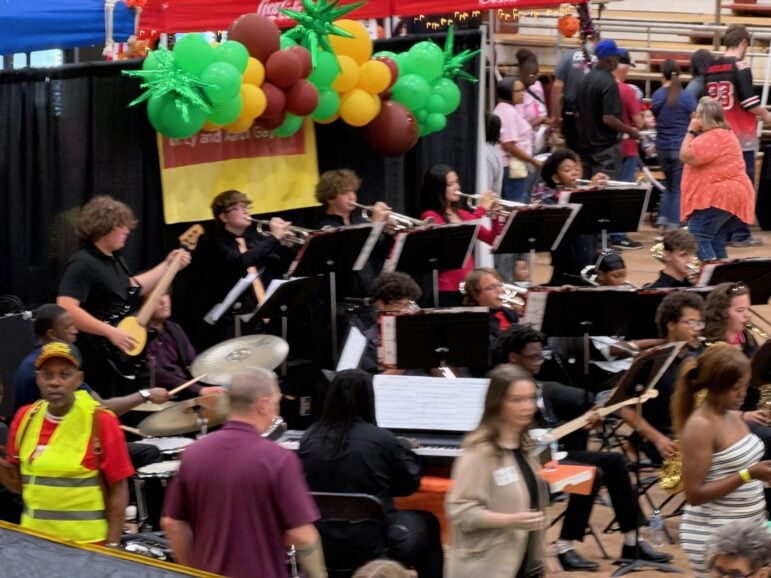 High school jazz band with trumpets, saxophones and guitar performing at Taste of Texarkana